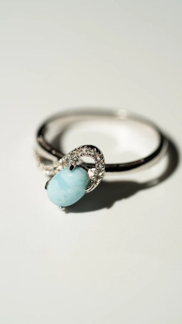 Larimar Ring mit Topas Welle