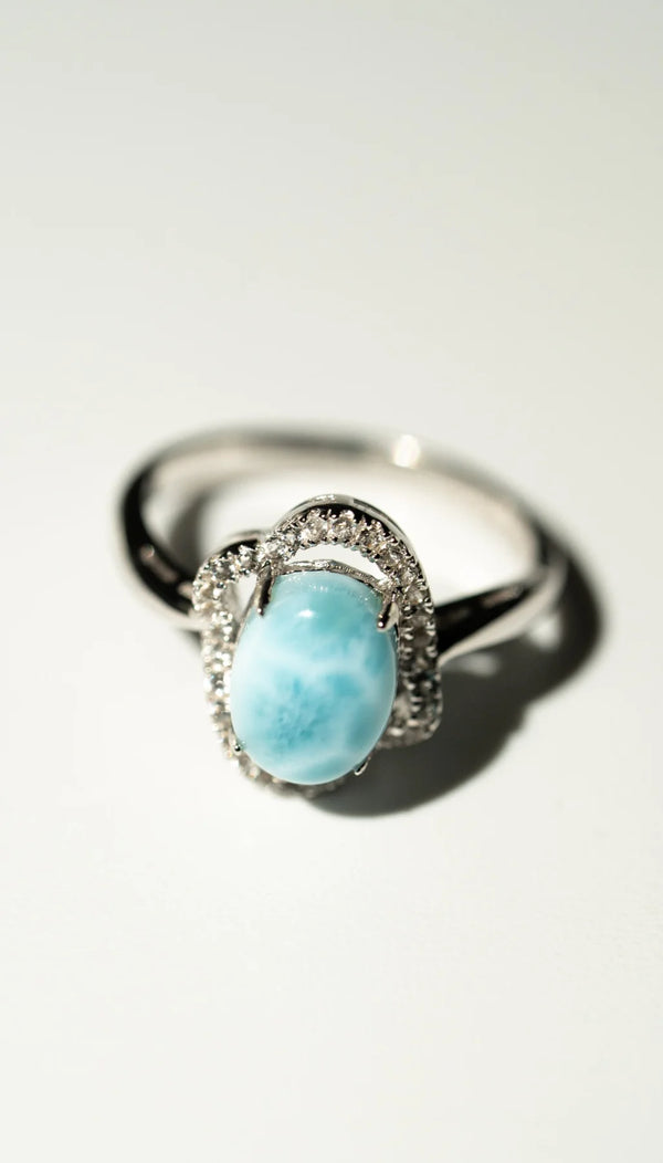 Larimar Ring mit Topas Kranz