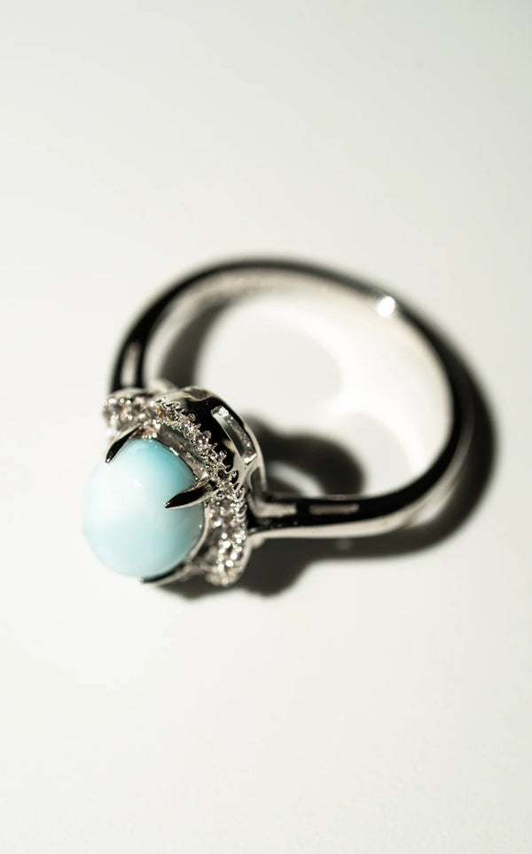 Larimar Ring mit Topas Kranz